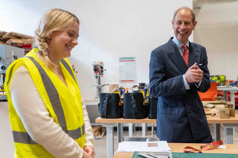 HRH The Duke of Edinburgh laughs with MEng student Grace Keating following a demonstration of her end of year project - picture contributed