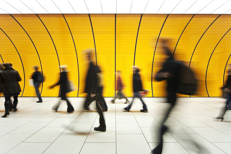 blurred people walking